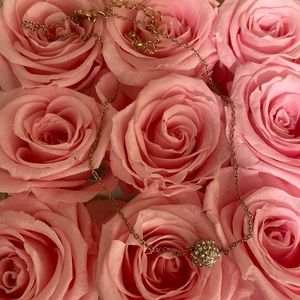 Kate Spade rose gold necklace with bedazzled pendant